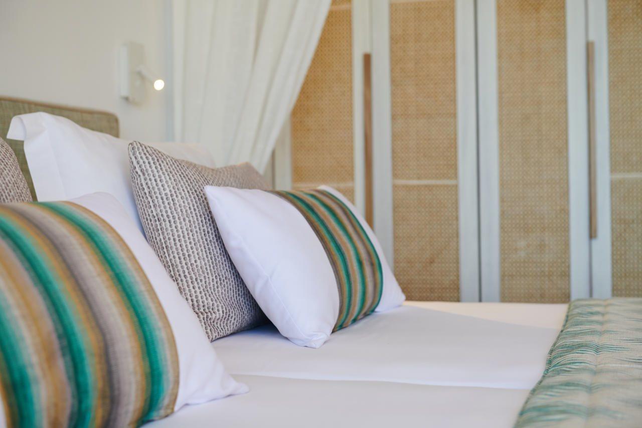 Grupotel Cala San Vicente Sant Joan De Labritja Esterno foto Pillows on a bed